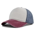 Detail view of tri-color distressed baseball cap with beige, burgundy, and denim blue patchwork - Burgundy