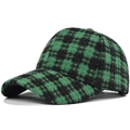Detailed view of the thick green and black plaid tweed texture on the baseball cap - Adjustable / Green