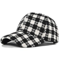 Close-up of thick black and cream plaid tweed texture on an autumn winter baseball cap - Adjustable / White