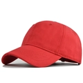 Detail view of red cotton twill baseball cap showing curved brim and reinforced stitching - Adjustable / Red