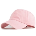 Close-up of pink cotton baseball cap featuring classic six-panel design and curved brim - Adjustable / Pink