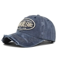 Nahaufnahme der New Orleans 3D-Stickerei auf einer gewaschenen Vintage-Baseballkappe - Verstellbar / Marineblau
