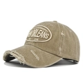 Detailed close-up of khaki New Orleans embroidery on vintage washed distressed baseball cap - Adjustable / Khaki