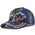 Dark blue denim baseball cap featuring a large colorful rhinestone butterfly pattern - Adjustable / Navy Blue (Slanted Butterfly)