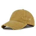 Detail of distressed brim and frayed holes on a vintage washed cotton baseball cap - Adjustable / Yellow