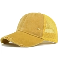 Detail of distressed yellow baseball cap with ripped effects and breathable mesh back - Yellow