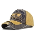 Close-up of distressed vintage New York baseball cap with embroidery and frayed edges - Coffee and Yellow
