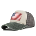Detailed view of the vintage American flag print on a washed distressed trucker hat - Army Green