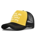 Detail view of the yellow trucker hat with white movie quote print and black mesh - Adjustable / Black Yellow