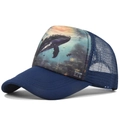 Detail of navy blue mesh trucker hat featuring a colorful ocean whale print and curved brim - Adjustable / Navy Blue Whale