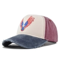 Close-up of distressed denim brim and vintage eagle print on a red white blue baseball cap - Adjustable / Navy Blue