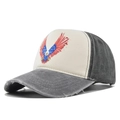 Macro shot of distressed grey denim baseball cap brim with vintage frayed edge detail - Adjustable / Gray