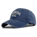 Close-up of Florida 1822 Miami embroidery on navy washed denim baseball cap detail - Navy Blue