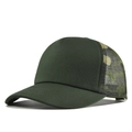 Detail of green cotton crown with camouflage mesh back on a breathable trucker hat - Green