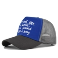 Blue and gray mesh trucker hat featuring white cursive slogan print on front - Adjustable / Dark Grey/Blue