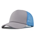 Detail view of the gray twill brim and blue breathable mesh on a 5-panel trucker cap - Grey + Blue