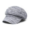 Front view of a tweed newsboy cap with classic black and white texture pattern - M (56-58cm) / Black