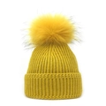 Detailed close-up of bright yellow knit beanie with soft pom-pom and thick ribbed texture - M / Yellow