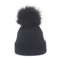 Detail of black ribbed knit beanie with soft faux fur pompom for winter warmth - M / Black
