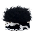 Detailed close-up of textured faux fur top and cow print knit pattern on beanie hat - Black Wig Cow Print