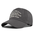 Close-up of vintage 1980 embroidery and white stitching on dark grey baseball cap - Gray