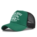 Detail view of the Omaha Beach D-Day printing on a green and black mesh trucker cap - Grass Green