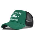 Close-up of green and black trucker hat with mesh back and retro rodeo printing - Adjustable / Grass Green