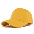 Detail shot of a bright yellow cotton baseball cap with 6-panel structure and curved brim - Yellow