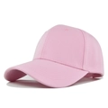 Detail of pink 6-panel cotton baseball cap showing side profile and curved visor - Pink
