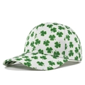 Close-up of a white baseball cap featuring vibrant green four-leaf clover prints and twill fabric - Adjustable / Green Clover (CP982-4)