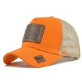 Detail of orange mesh trucker hat featuring a leather tractor patch and USA flag embroidery - Orange with Beige Mesh