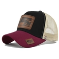 Close-up of cattle leather patch on mesh trucker hat with vintage embroidery details - Adjustable / Wine Red and Black