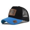 Detail of blue brim and mesh trucker hat with brown leather cow patch on black crown - Adjustable / Blue/Black