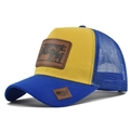 Detail view of yellow trucker hat with leather cow patch and blue mesh backing - Adjustable / Blue And Yellow Mix