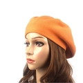 Detailed view of the orange knitted wool beret with high-elasticity woven texture - M (56-58cm) / Orange