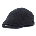 Close-up of black beret featuring 3D geometric embroidery and adjustable metal buckle - Adjustable / Black