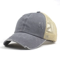 Close-up of vintage distressed mesh baseball cap with frayed edges and washed fabric - Adjustable / Gray