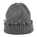 Close-up of distressed dark grey knitted beanie with vintage ripped texture and frayed edges - One Size / Gray