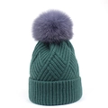 Detail of dark green knit beanie featuring ribbed texture and large grey faux fur pom-pom - One Size / Dark Green