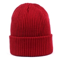 Detailed close-up of dark red ribbed knit texture on a thick winter beanie hat - Burgundy