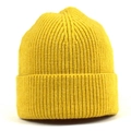 Detail shot of bright yellow knit beanie featuring thick vertical ribbed texture and wide cuff - One Size / Yellow