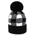 Winter women's black and white buffalo check knit beanie with a fluffy pom-pom top - Black