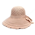 Detail view of pink knit sun hat featuring hollow mesh top and soft lace ribbon bow - M / Apricot