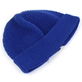 Detail of navy blue knit beanie showing thick ribbed texture and rolled edge design - Adjustable / Sapphire Blue