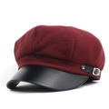 Detail view of burgundy wool newsboy cap with black leather brim and silver buckle - M / Burgundy