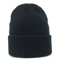 Classic black ribbed knit beanie for winter featuring a minimalist cuffed design for warmth - Black
