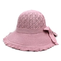 Detail of pink knitted sun hat showing hollow diamond pattern and lace brim bow - M / Pink