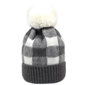 Grey and white checkered knit beanie with a fluffy faux fur pompom for winter - Gray