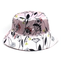 Detail view of pink and white floral satin bucket hat with foldable sun protection design - Pink and White Patchwork Floral (4785575778533)