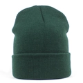 Close-up detail of dark green ribbed knit beanie showing thick texture and stitching - One Size / Dark Green